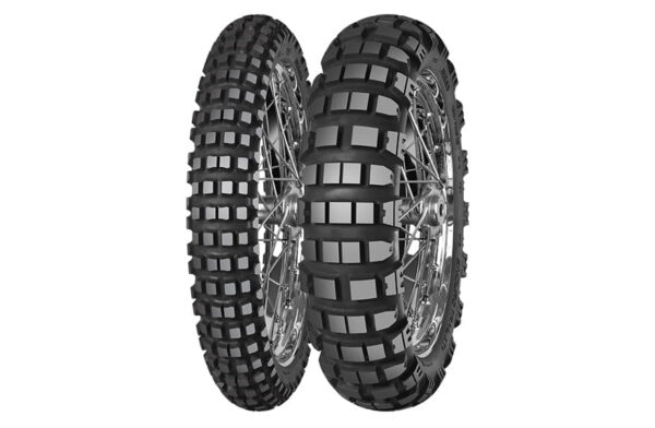 The Mitas Enduro Trail XT+ is a high-quality motorcycle tire designed for adventure riders who need optimum performance both on and off the road. This tire is engineered to provide exceptional grip, durability, and versatility across various terrains, allowing riders to explore with confidence and control. The Mitas Enduro Trail XT+ features a specialized tread pattern that combines aggressive off-road capabilities with reliable on-road performance. The deep, widely spaced knobs provide excellent traction and stability on muddy or loose surfaces, ensuring optimal off-road handling. Additionally, the unique block design promotes self-cleaning, preventing the accumulation of mud or debris that could hinder performance. On paved roads, the Enduro Trail XT+ delivers smooth and precise handling with its innovative design. The carefully engineered tread pattern enhances stability, cornering, and braking, providing riders with a reliable grip and increased control during on-road adventures. This versatility makes it a suitable tire for long-distance tours or daily commuting. Durability is a key aspect of the Mitas Enduro Trail XT+. The tire incorporates a robust construction with reinforced sidewalls, ensuring resistance to punctures and cuts even in rugged terrains. This construction helps maximize the tire's lifespan and reliability, allowing riders to tackle challenging trails without worrying about tire damage. For adventure riders who frequently encounter different weather conditions, the Mitas Enduro Trail XT+ offers enhanced wet grip. The tire's compound and tread pattern are optimized to provide excellent traction on wet surfaces, effectively dispersing water and reducing the risk of hydroplaning. Whether you're embarking on an off-road exploration or seeking a reliable tire for your adventure touring needs, the Mitas Enduro Trail XT+ is designed to exceed expectations. With its outstanding performance, durability, and all-terrain capabilities, this tire ensures a thrilling and secure riding experience under various conditions, making it an excellent choice for adventure enthusiasts.